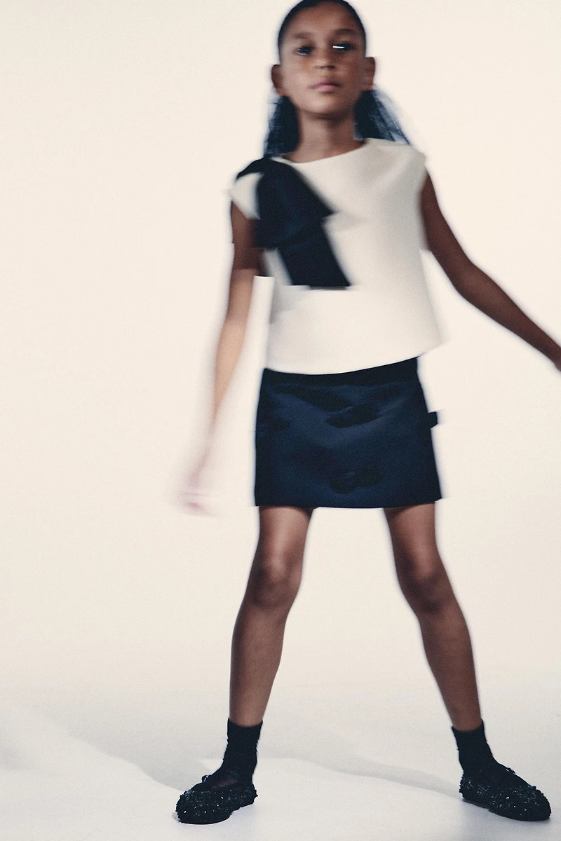 JUPE APPLIQUE LACETS