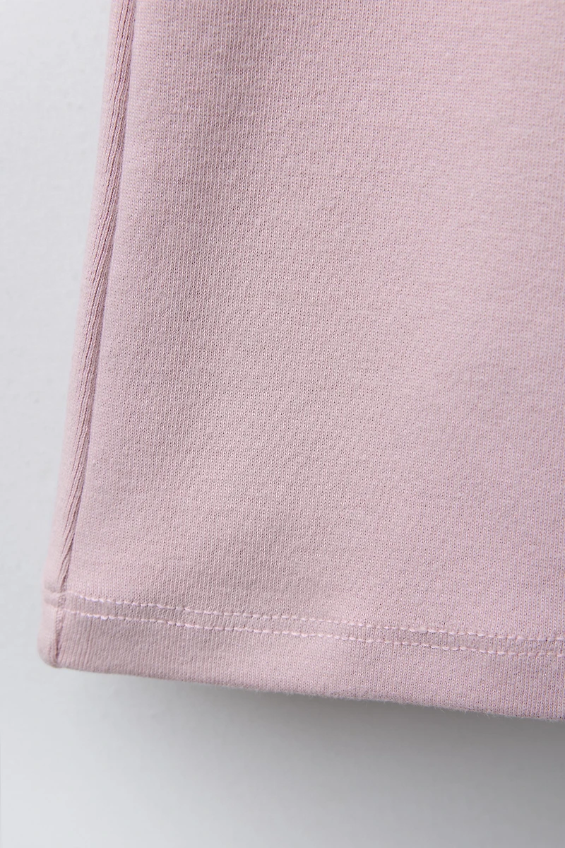 INTERLOCK FLARE LEGGINGS WITH LABEL DETAIL