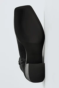 LEATHER HEELED BOOTS