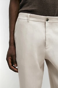 Tapered fit linen trousers