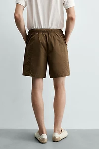 SEAMED SWIM SHORTS