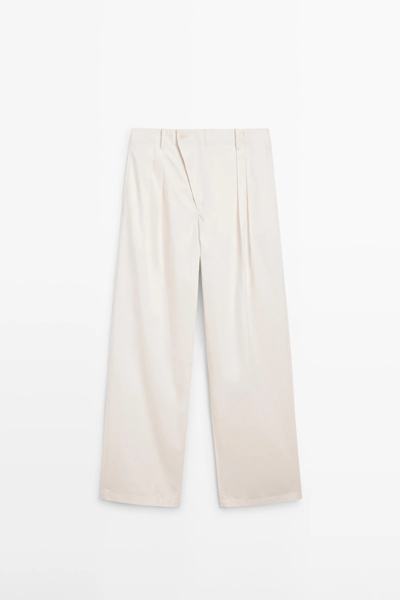 Pleated trousers with crossover fastening - STUDIO