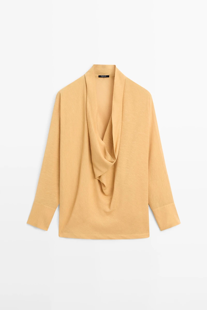 Flowing blouse with draped neckline
