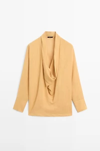 Flowing blouse with draped neckline
