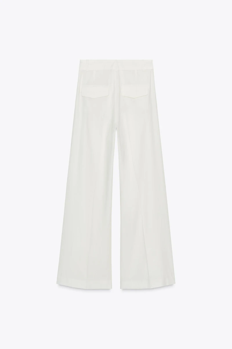 PLEATED PANTS WITH FLAPS