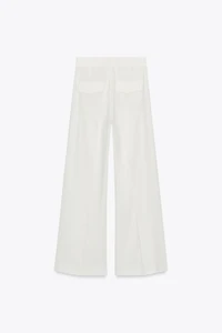 PLEATED PANTS WITH FLAPS