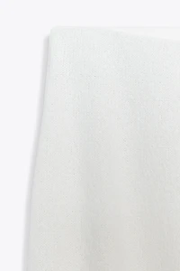 CUT-OUT KNIT MIDI SKIRT