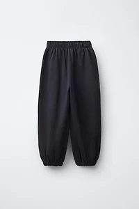 BALLOON PLUSH PANTS WITH TEXT