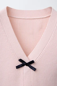 GILET EN MAILLE À NŒUDS