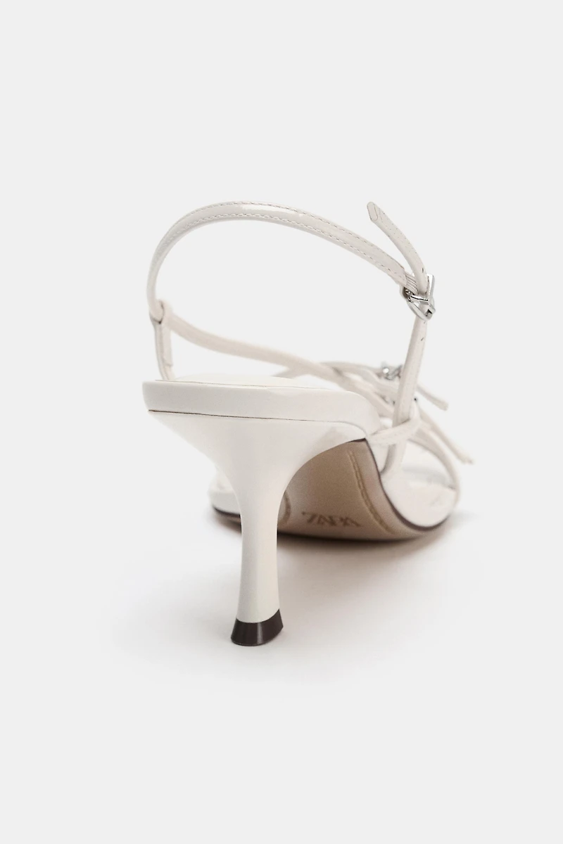BUCKLED HEELED SANDALS