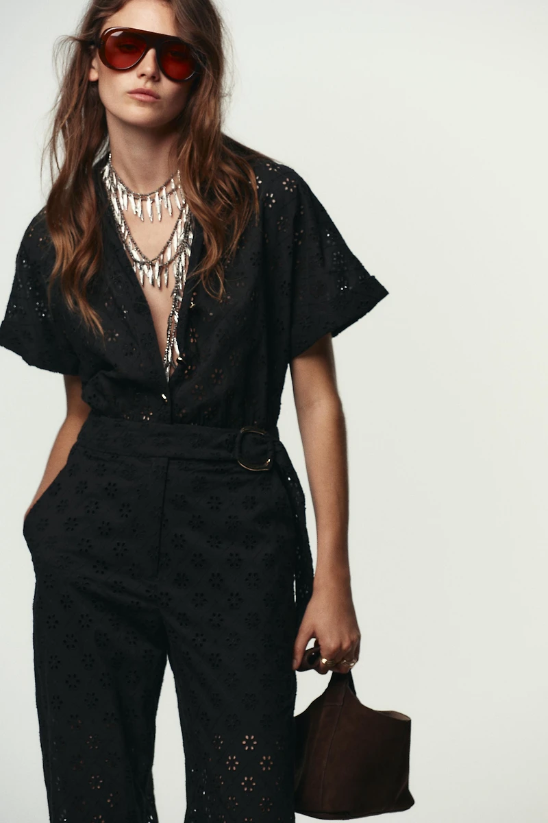 EMBROIDERED EYELET BUCKLE JUMPSUIT