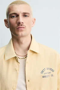PRINTED TEXT BOXY FIT SHIRT