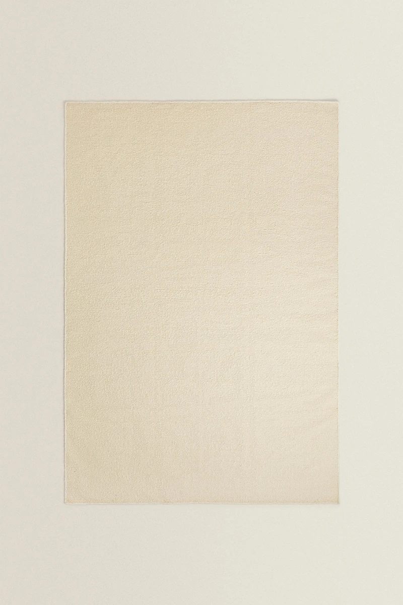 WAVY DETAIL WOOL AREA RUG