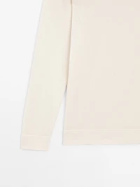 Knit sweater with a polo collar