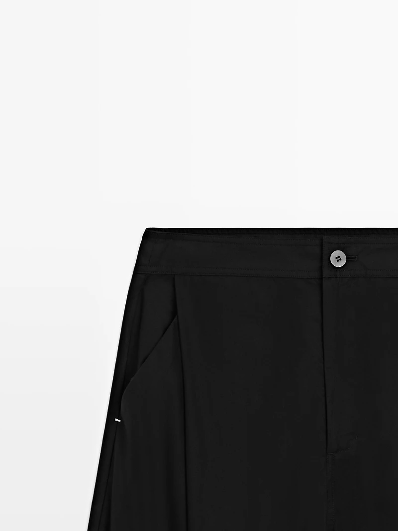 Barrel fit trousers with turn-up detail