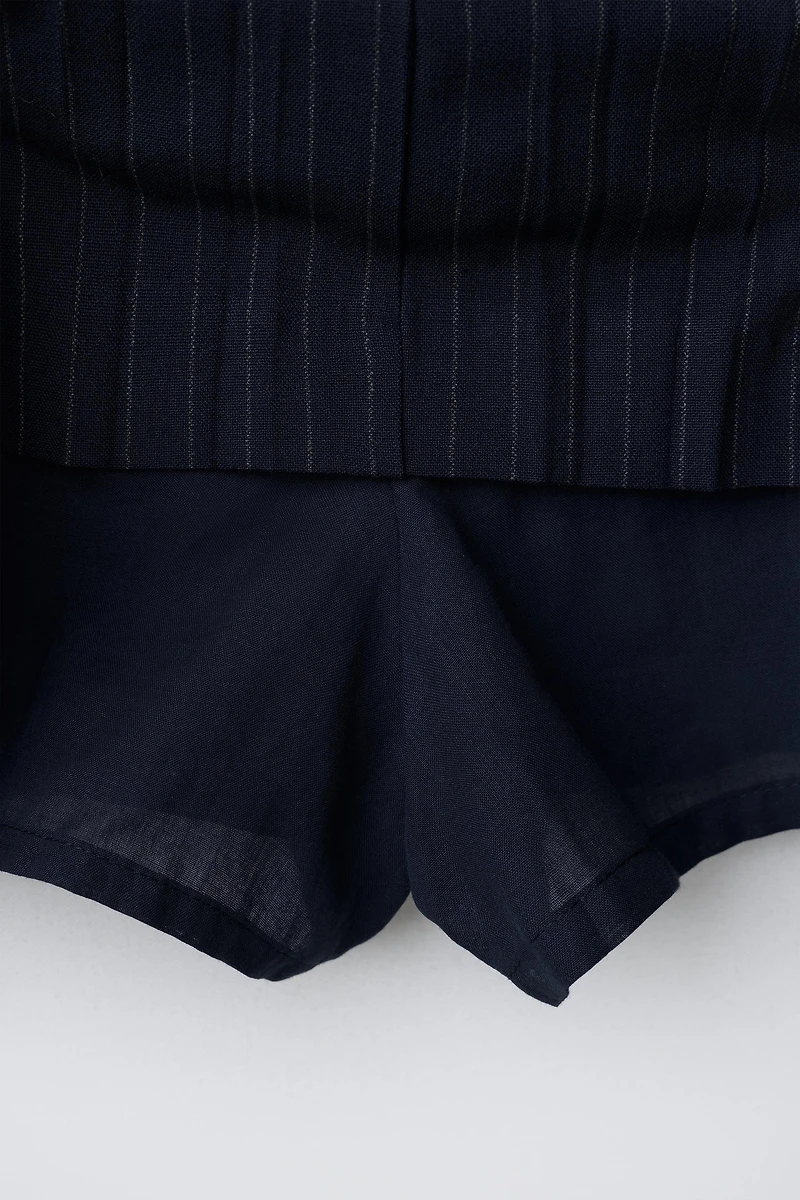 BELTED PINSTRIPE SKIRT