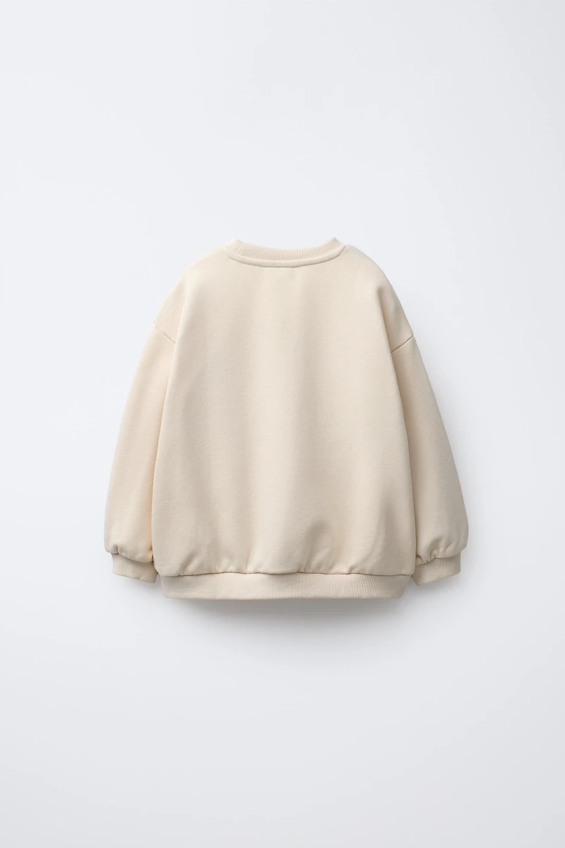 HEART POCKET SWEATSHIRT