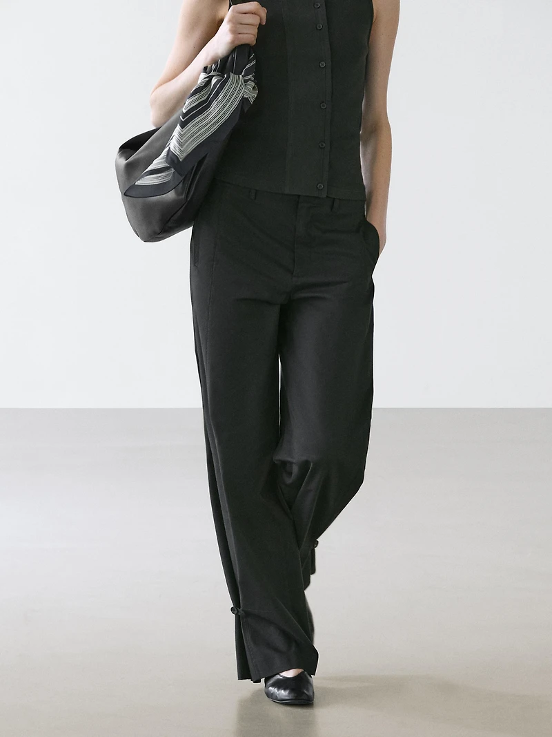 Cotton blend trousers with hem detail