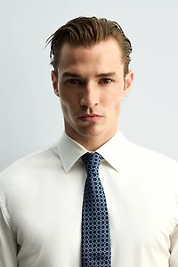 100% SILK GEOMETRIC JACQUARD TIE
