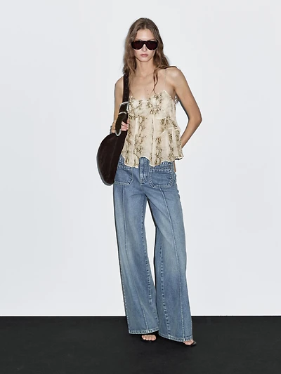 Ruffled snakeskin print top with gathered detail
