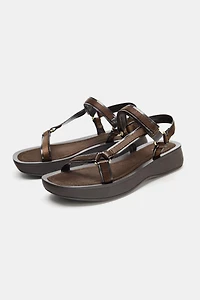 STRAPPY ADHESIVE SANDALS