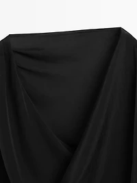 Top asymétrique semi-transparent