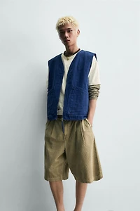 GILET EFFET DÉLAVÉ SURPIQÛRES
