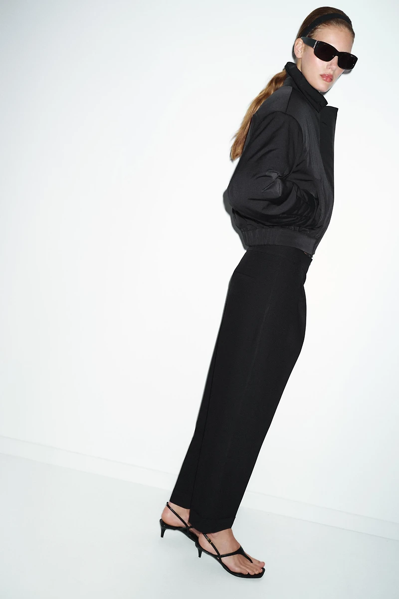 PLEATED PANTS WITH CUFFED HEM