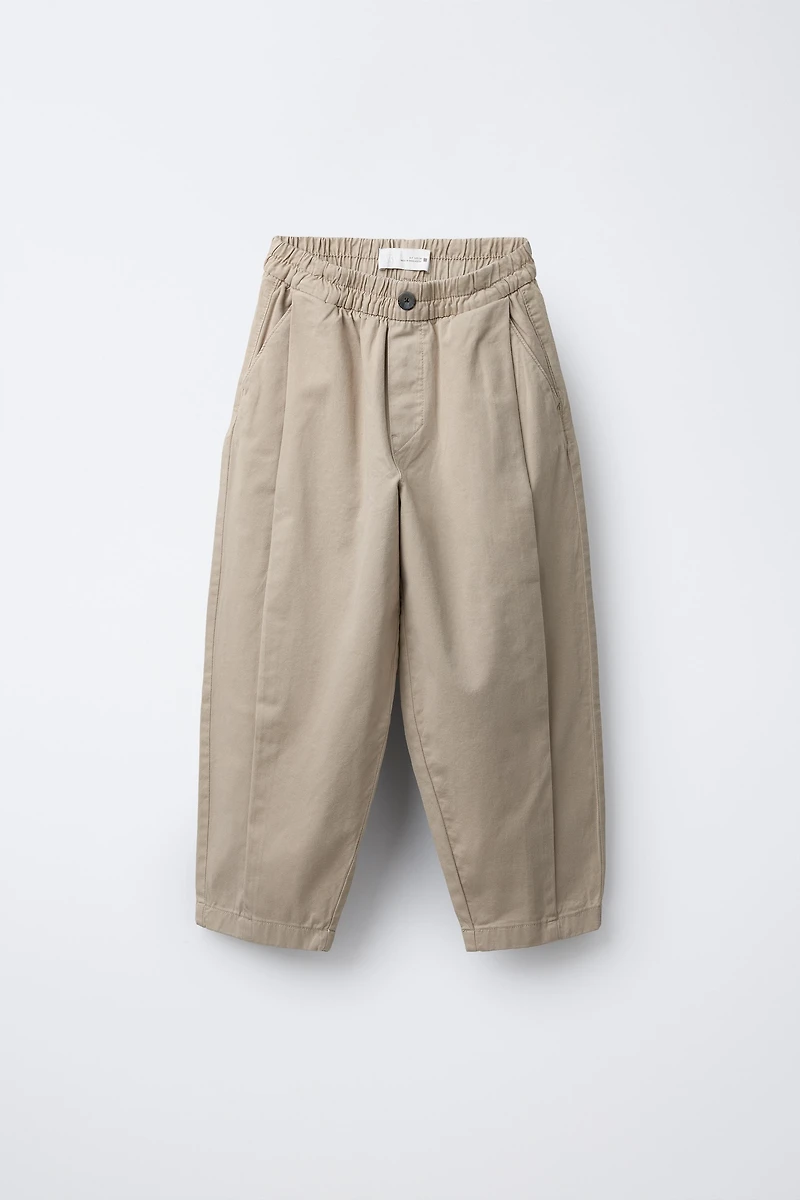 PANTALON BALLON À PLIS