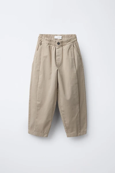 PANTALON BALLON À PLIS