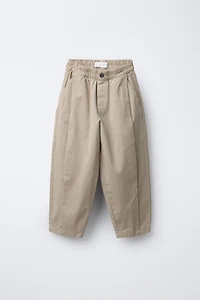 PANTALON BALLON À PLIS