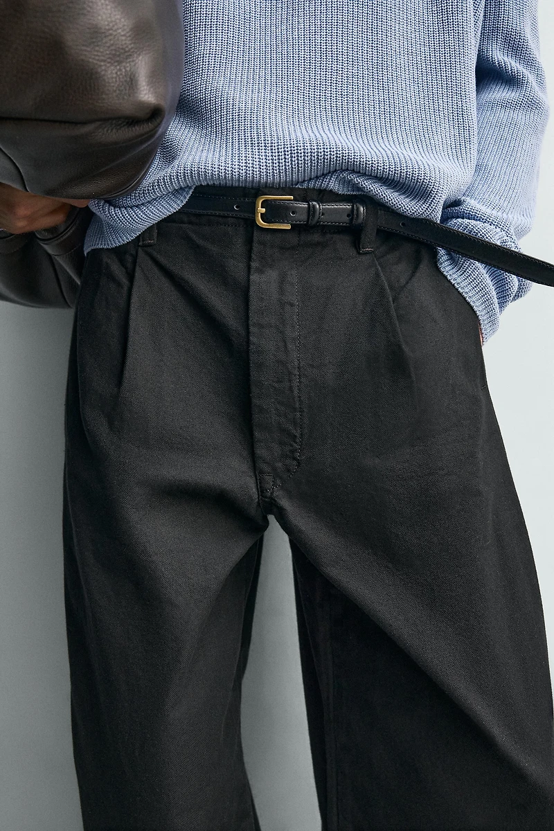 WIDE FIT PLEATED PANTS