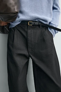 WIDE FIT PLEATED PANTS