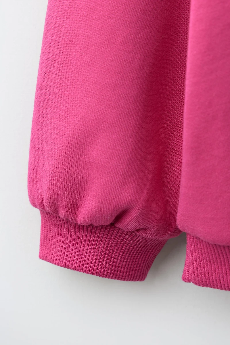 RUBBERIZED HEART INTERLOCK SWEATSHIRT