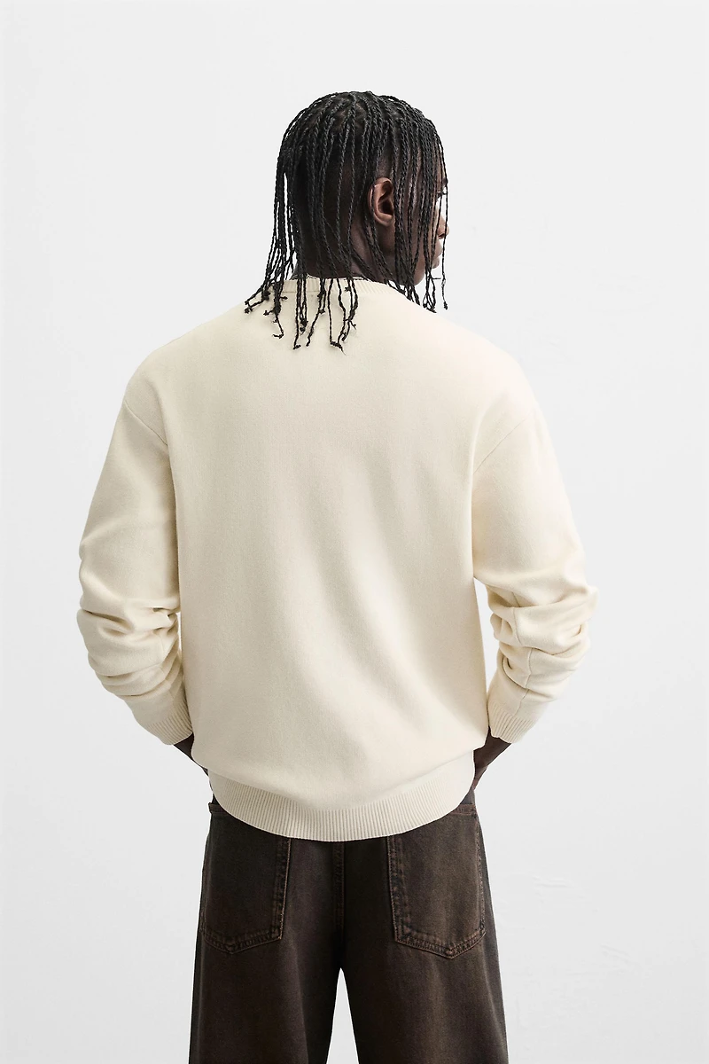 SOFT TEXTURED KNIT SWEATER