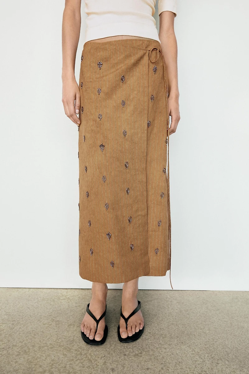 Midi pareo skirt with appliqués