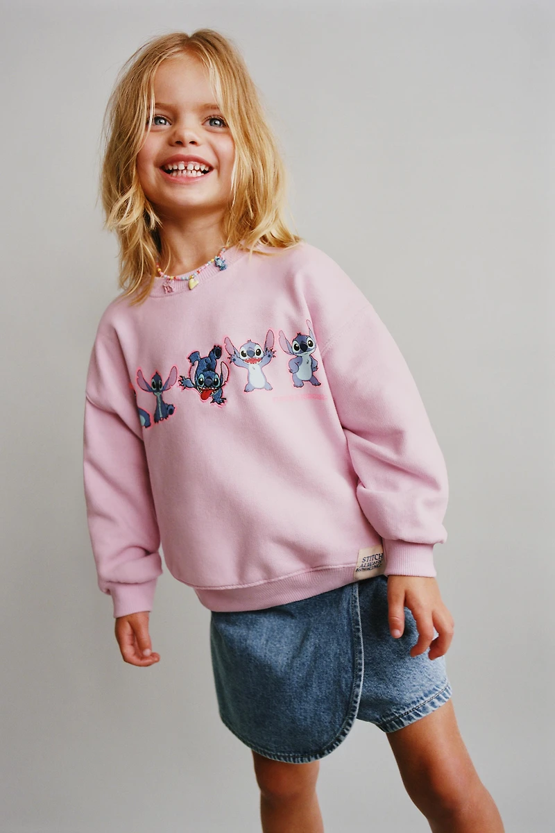 LILO & STITCH © DISNEY PRINTED SWEATSHIRT
