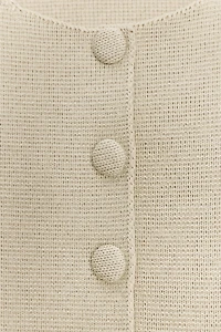 PEPLUM SHORT SLEEVE CARDIGAN