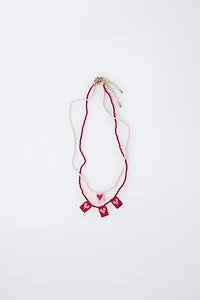 PACK OF TWO BEADED HEART NECKLACES