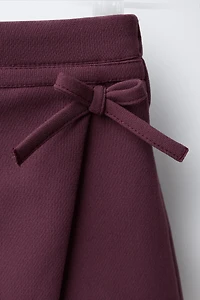 JUPE-SHORT AVEC NŒUD