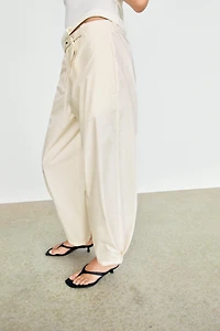 Cotton blend pants with tie detail