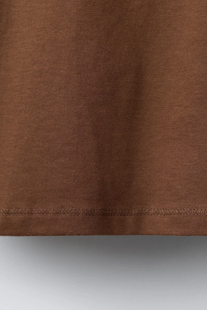 T-SHIRT À MANCHES RAGLAN ET INSCRIPTION