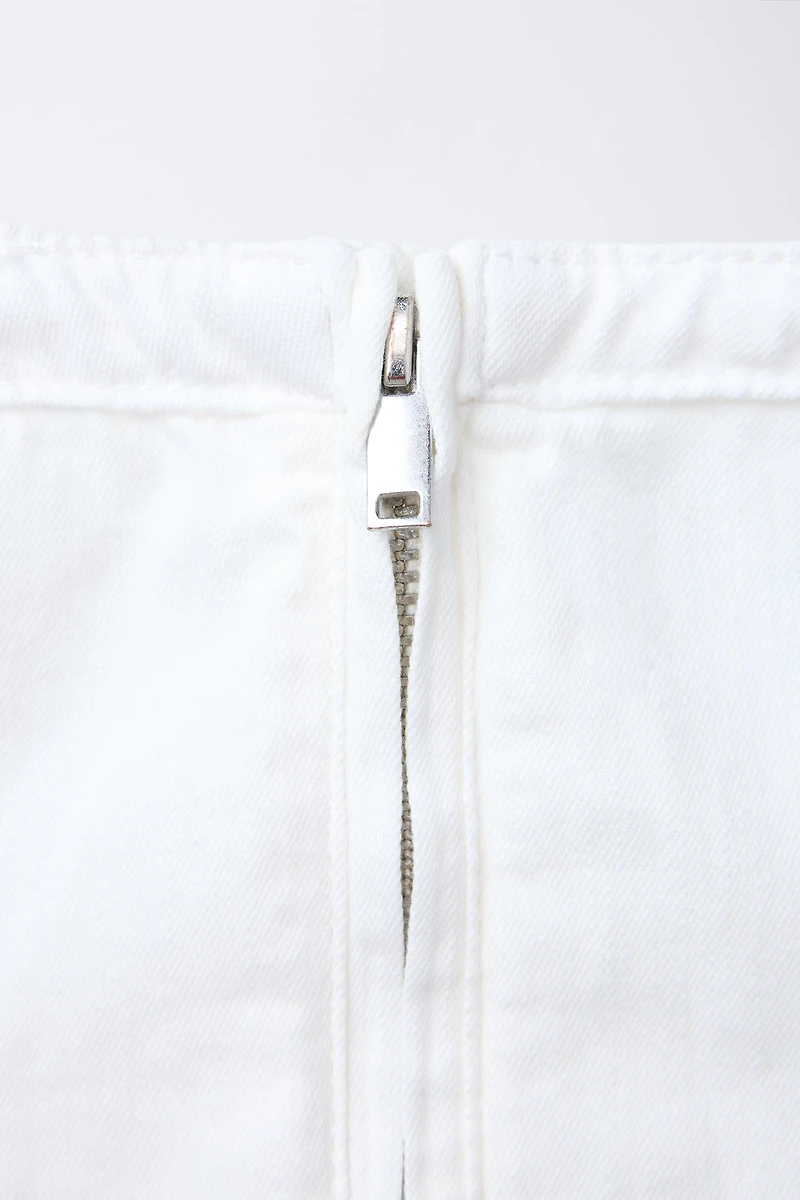 TOP SANS MANCHES ZIP