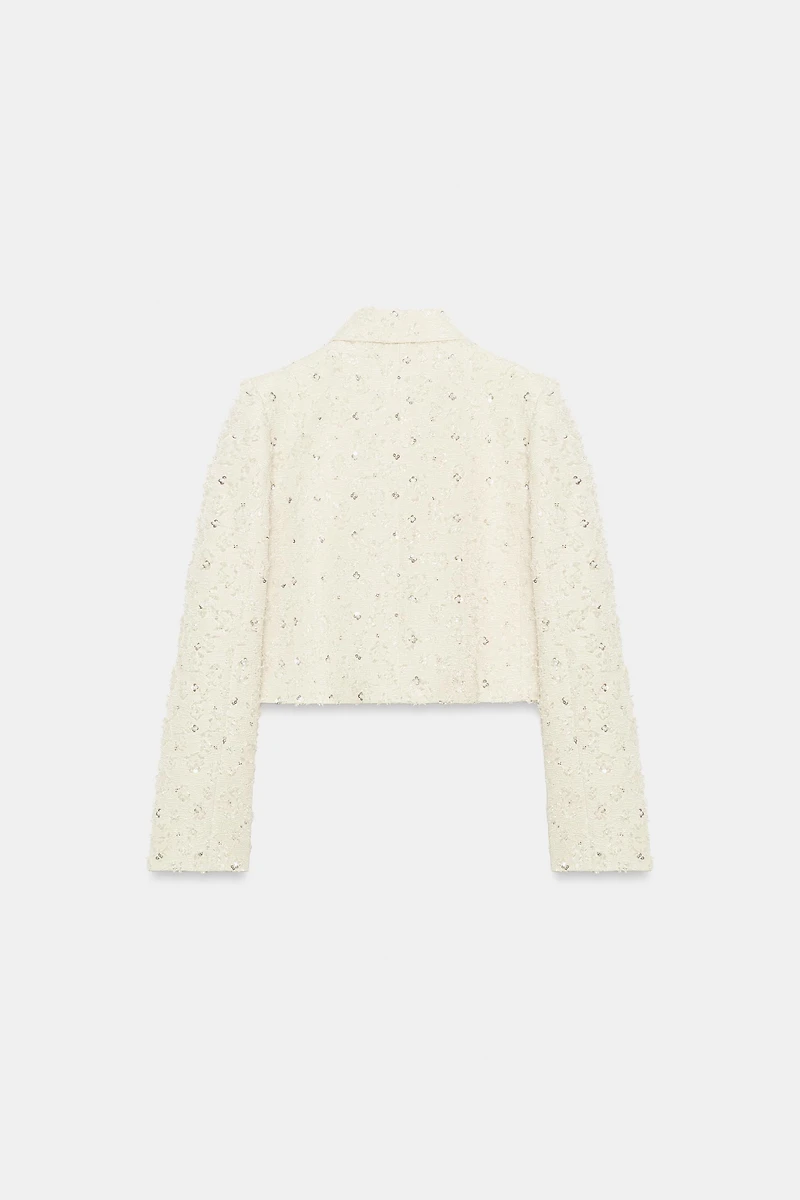 VESTE COURTE EFFRANGÉE À FANTAISIE