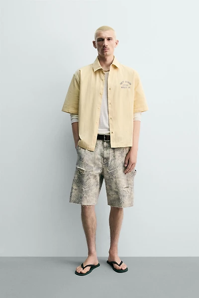 PRINTED TEXT BOXY FIT SHIRT