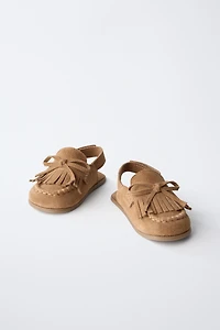 SABOTS EN CUIR PIEDS NUS