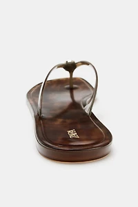 FLAT SANDALS WITH EMBELLISHMENT