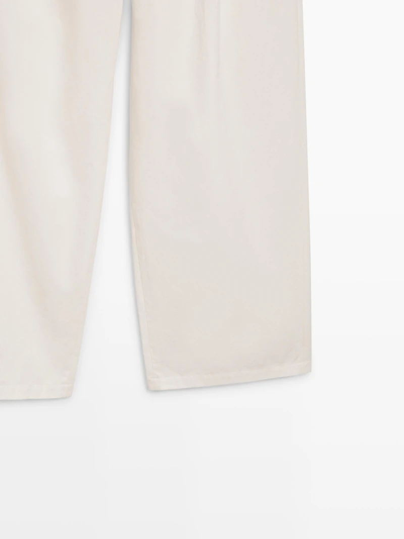 Pleated trousers with crossover fastening - STUDIO