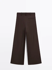 Flowing trousers with darts