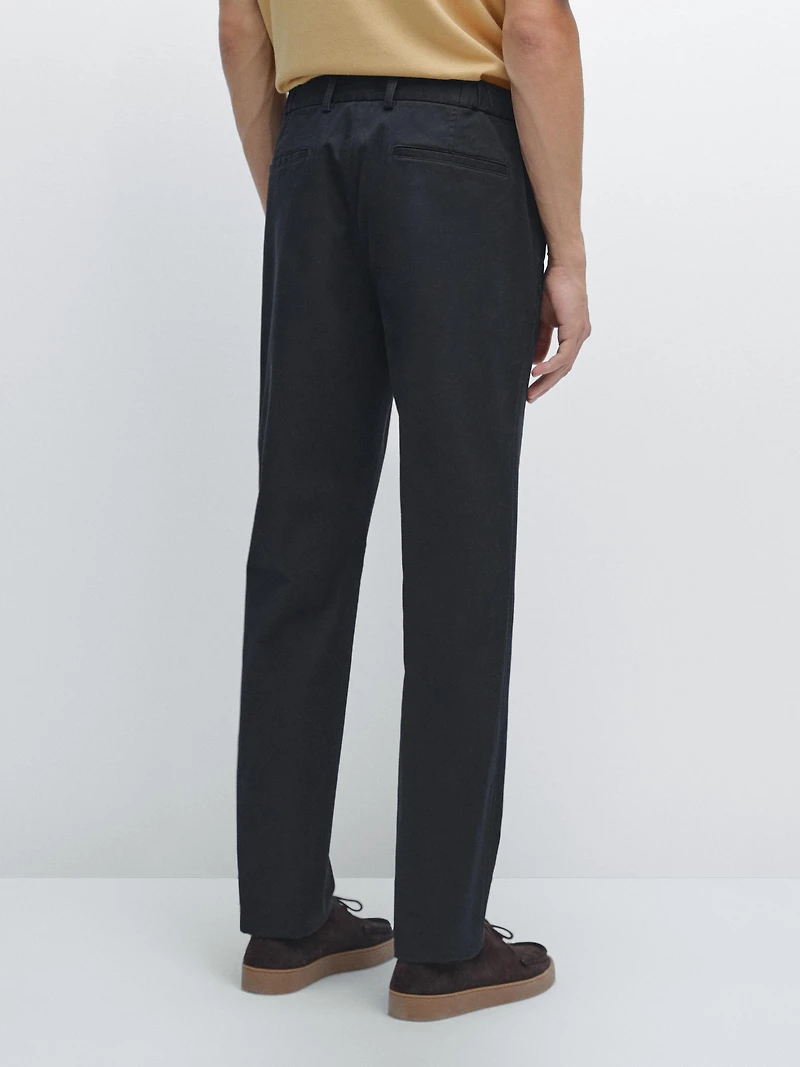 Slim fit trousers with elastic side detail